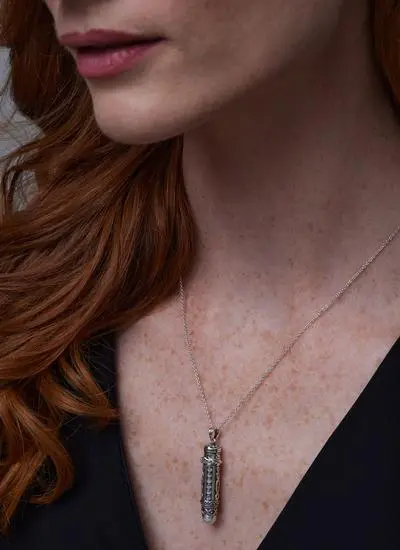 Close up of red haired model wearing Sterling Silver Marcasite Keepsake Pendant